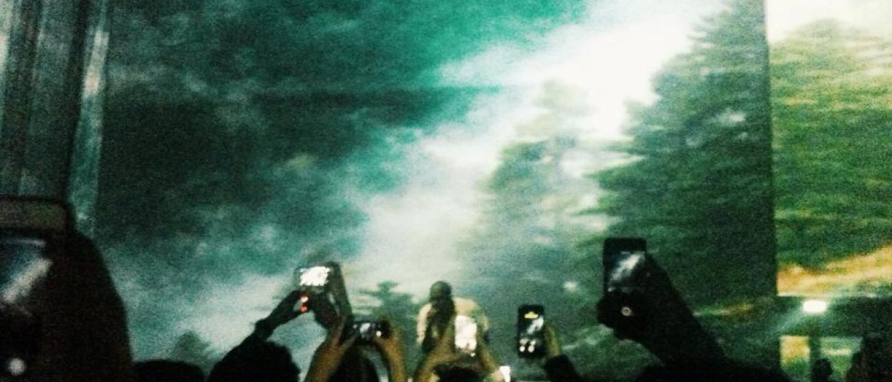 Crowded subway platform with passengers waiting for a train. This alt text was added with Al; accuracy may vary.