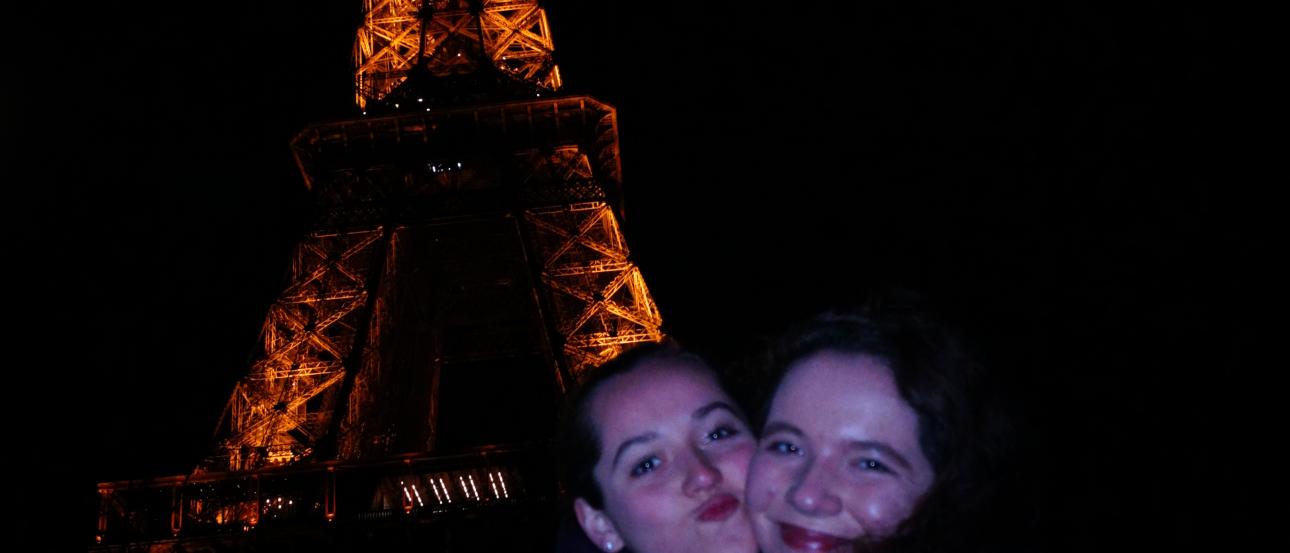 Terracotta Army sculptures in a large indoor exhibit hall. This alt text was added with Al; accuracy may vary.