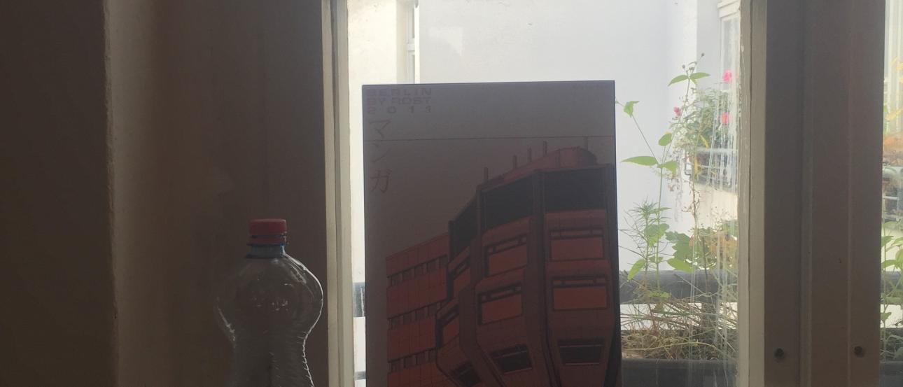 1. Person gazing at a lake from a leafy viewpoint.
2. Swan in water with a city skyline in the background.
3. Narrow street with colorful buildings under an archway.
4. Cliffs meeting the ocean under a cloudy sky.
5. Window sill with a water bottle and framed art. This alt text was added with Al; accuracy may vary.