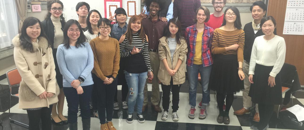 Elegant chandelier on wooden beam ceiling. This alt text was added with Al; accuracy may vary.