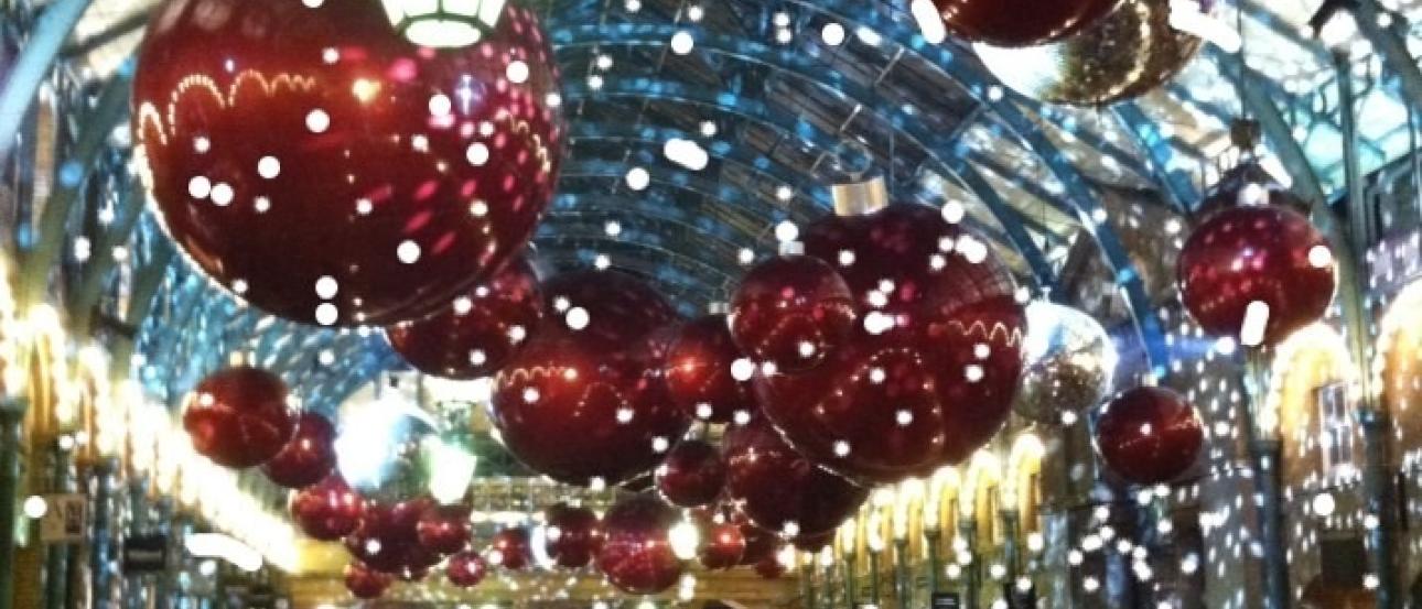 1. Cluster of pink, yellow flowers with green leaves.
2. Narrow alley with lantern, archway, soft lighting.
3. Brick archway entrance with lush greenery, warm lighting.
4. Narrow sunlit street, tall buildings, people walking.
5. Indoor market with large red ornaments, festive lights. This alt text was added with Al; accuracy may vary.