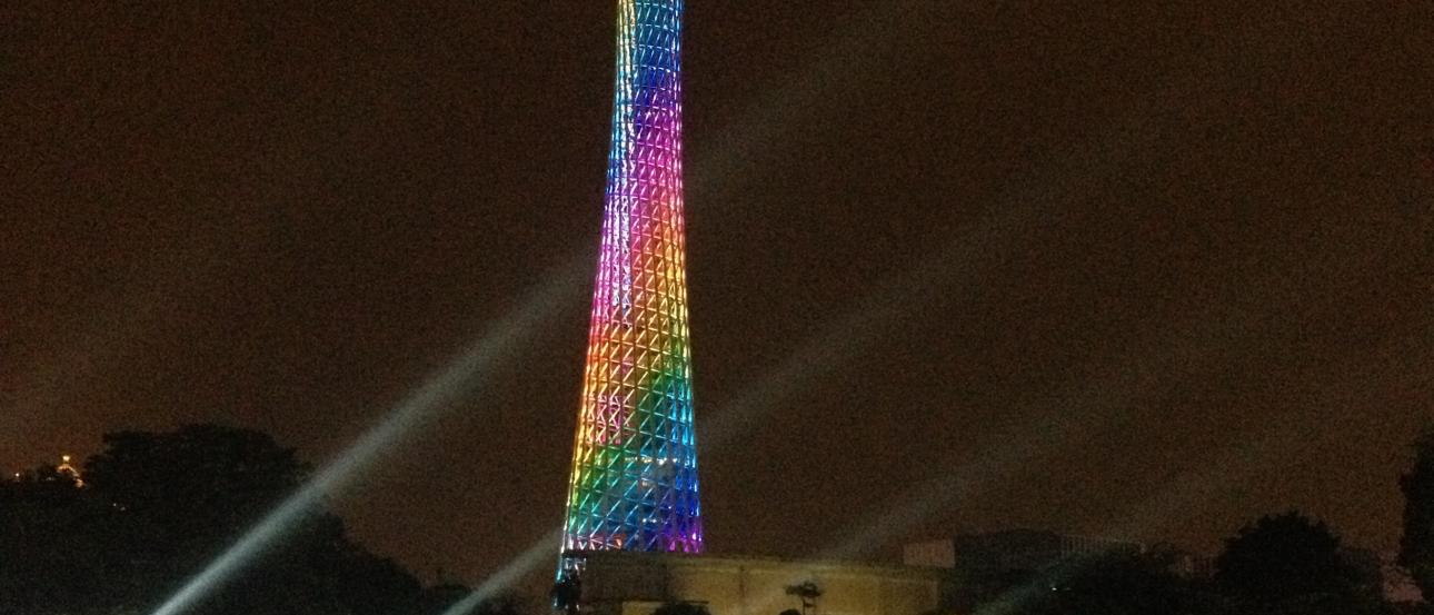Guitarists playing together outdoors with friends. This alt text was added with Al; accuracy may vary.