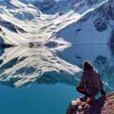 a student sitting on top of the mountain 