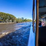 a woman on a boat in Delta Tigre