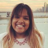 Dayna Mathew smiling at the camera