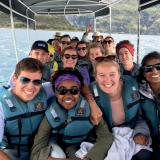 Students taking a boat tour in Ecuador