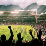 Crowd cheering on a football (soccer) game in Cape Town