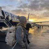 My friend Addy looking at the sunrise as we get off our plane in Paris