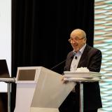 Greg Hess at podium at Annual Conference