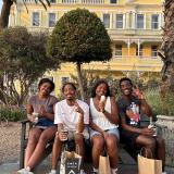 group of students on bench eating ice cream