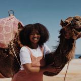 Student in Rabat Morocco with a camel