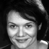 A headshot of a woman