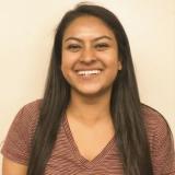 Raisa Hasque smiling.