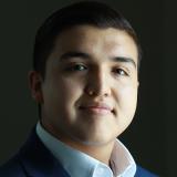 Bo Shimmin headshot, slight smile, wearing collared shirt