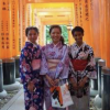 three students wear kimonos