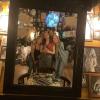 mirror photo of some friends in a jazzy vintage cafe