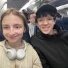 A picture of me and my partner Hayes in our seats on our flight to London.