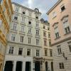 A row of pastel colored buildings in downtown Vienna.
