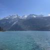 Mountains in Brienz next to the lake with aquamarine water