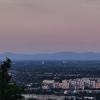 A view from Kahlenberg over Vienna with a beautiful sunset painting the sky a gentle red.
