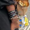 a picture of Maxwell's arm with a bag from the Lidl Grocery Store  