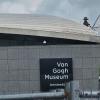 This is a far away snapshot of the sign labeled "Van Gogh Museum Amsterdam"