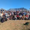 Denisse Luz Ramos Guzman smiling with friends while living in Cape Town, South Africa.