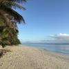 A flat, white sand beach coast