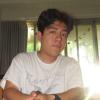 Jonathan Xique Hernandez posing in front of a window.