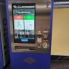 This is a blue Metro ticket machine with a large touch screen in the center.