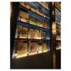 The following image includes books from Hotel España