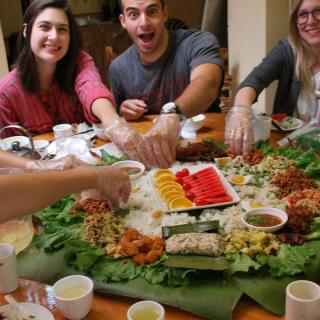 students celebrating thanksgiving at the table