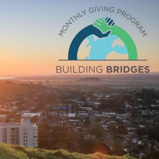 An image saying "Monthly giving program Building Bridges"
