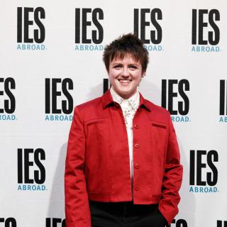 A person in front of a background that says IES Abroad