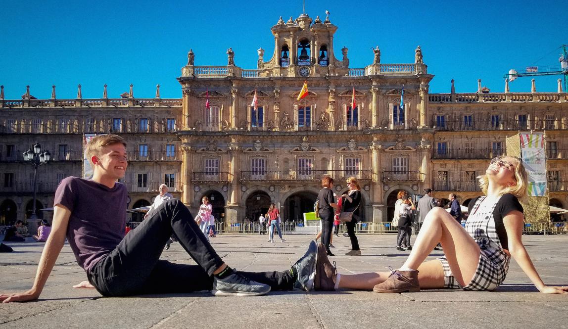 students posing for a fun photo in front of Plaza Mayor in Salamanca