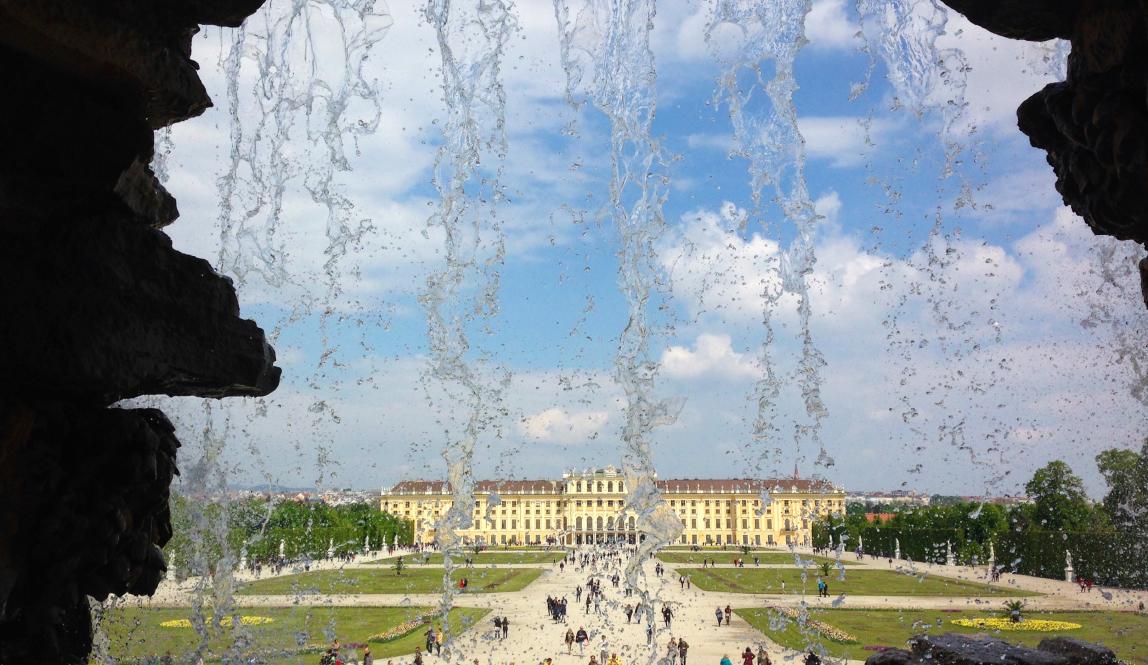 Schönbrunn Palace in Vienna from behind a fountain