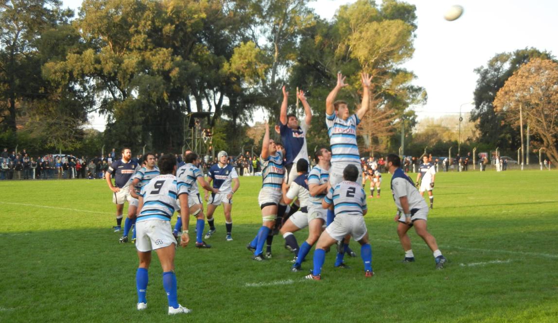 a group of male students playing rugby in Buenos Aires