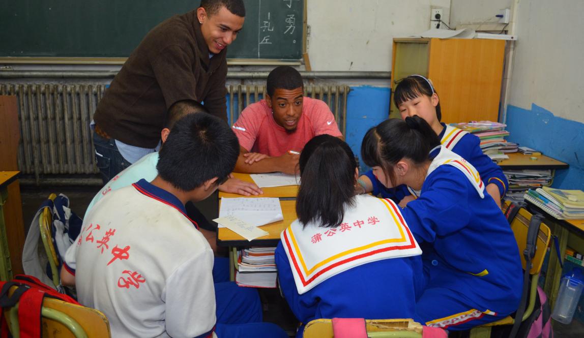 student teacher teaching students in a classroom in Shanghai
