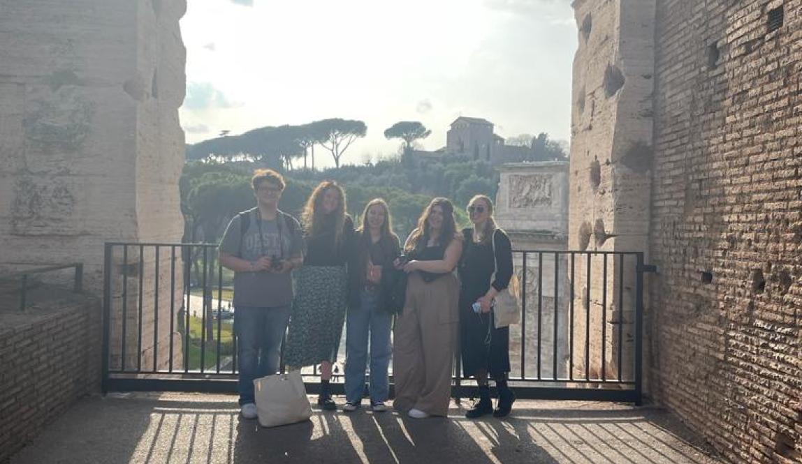 A picture of my friends and I at the Colosseum in Rome