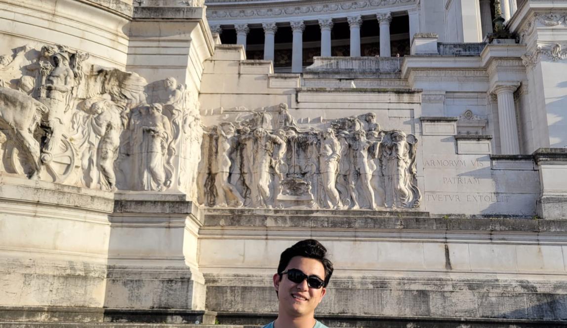Shown is a picture of me in front of some of the impressive architecture of the Altar of the Fatherland monument.