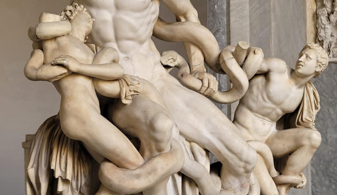 Shown is a statue of Laocoön and His Sons fighting the serpents following the famous myth.