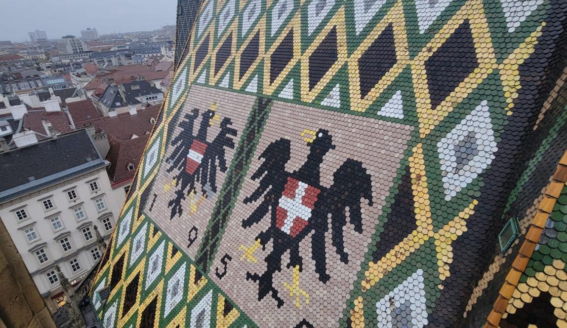 Shown is one of the roofs of the cathedral boasting the Austrian coat of arms 