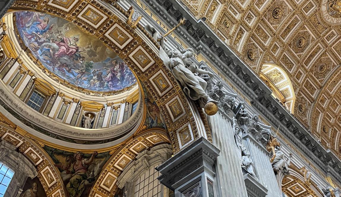 Gold and painted arched ceilings in St Peter's Basilica