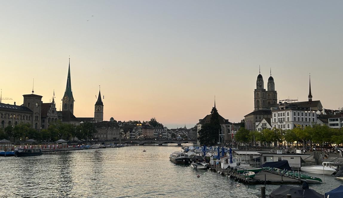 View of Zurich on the water during sunset