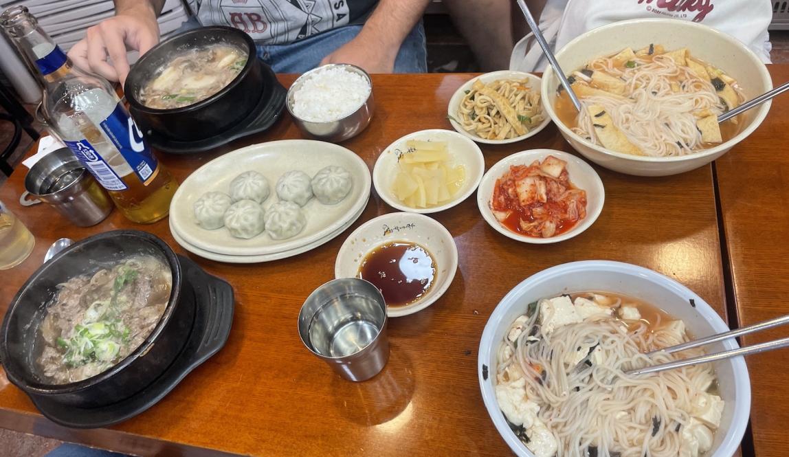 Image of several noodle dishes at Korean restaurant 