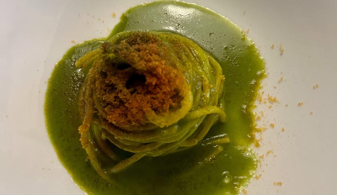 Plate of gluten free pasta with herb sauce in Florence