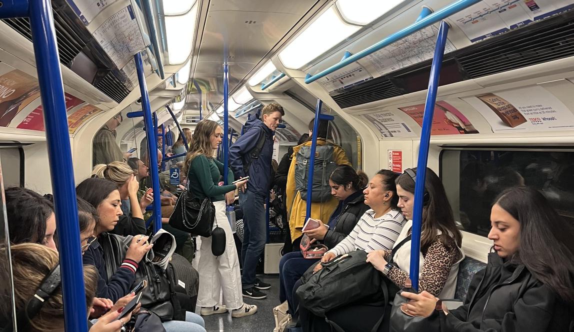 People are pictured sitting at the tube.