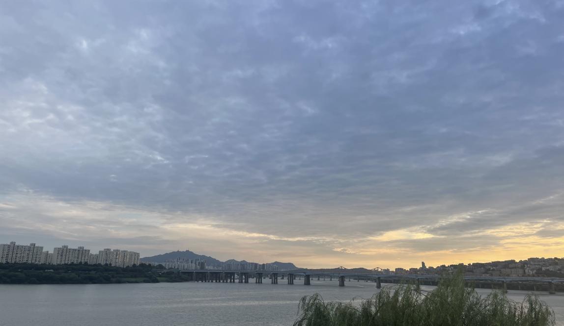 Image of Han River and Seoul skyline at sunset  