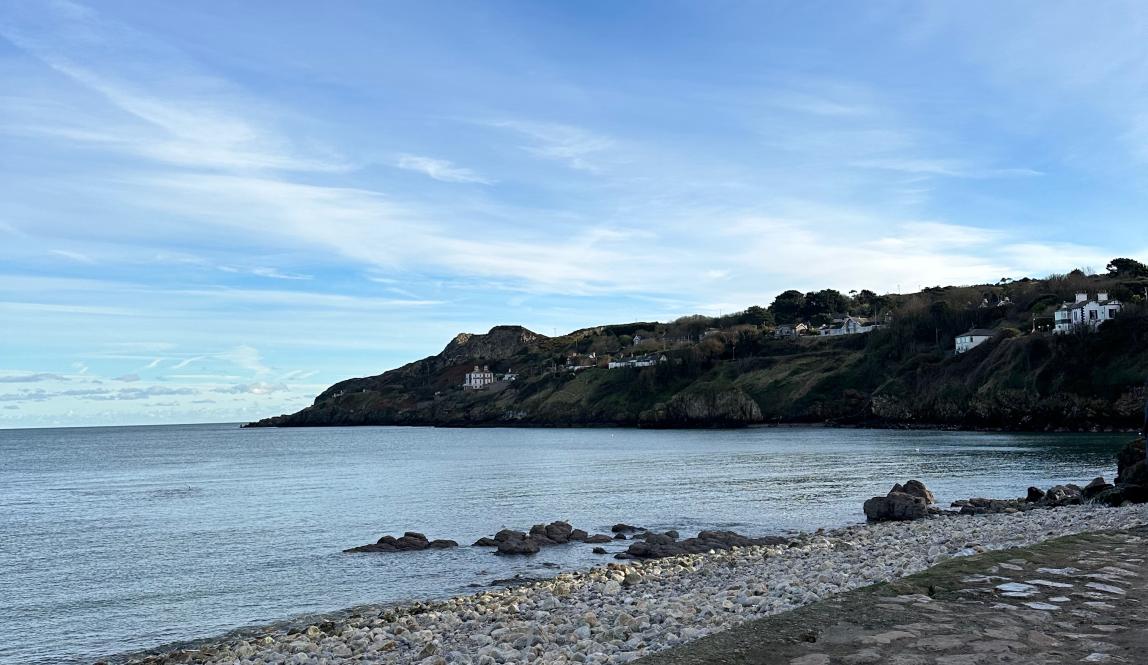 Beach in Howth in the afternoon overlooking a cliff
