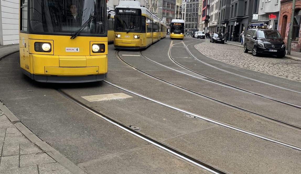 Multiple trams stopped on a Berlin street